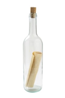 Studio shot of glass bottle with message inside