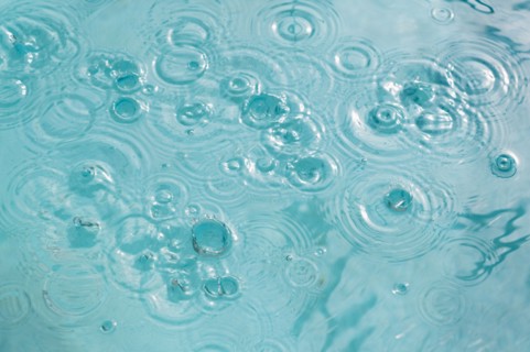 Concentric ripples on water surface