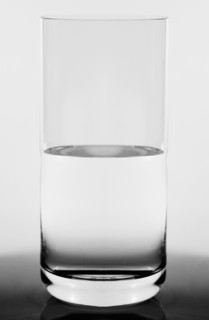 Studio shot of  glass half full concept