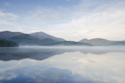 Calm surface of Lake Placid and Whiteface Mountain