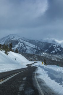 Road through snowy mountains