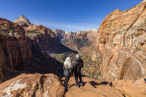 Senior couple looking over Zion Canyon in Zion National Park