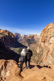 Senior couple looking over Zion Canyon in Zion National Park