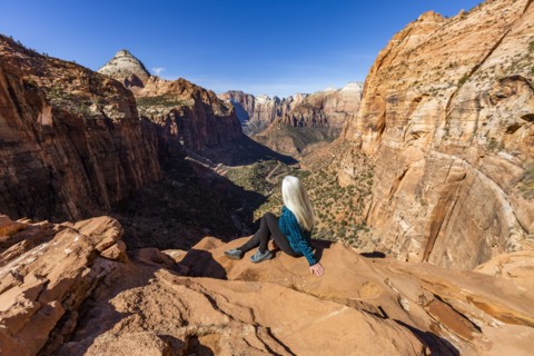 Senior woman at overlook above Zion Canyon in Zion National Park