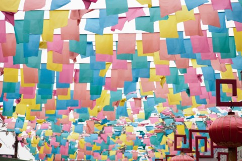 Paper flags over city street