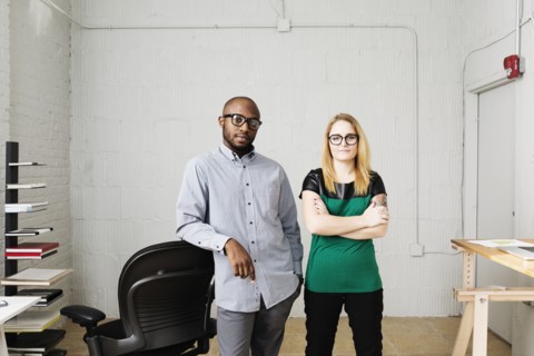 Portrait of business partners in design office