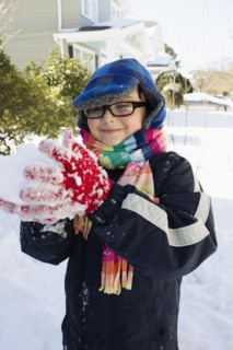 Boy making snowball