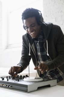DJ using mixing desk