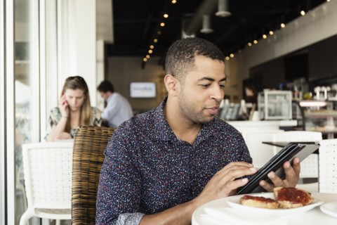 Young man in coffee shop