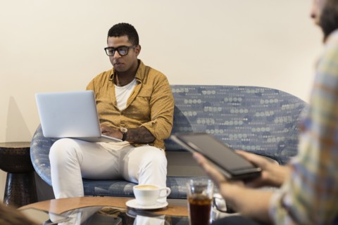 Young man in coffee shop