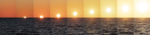 Sequence of Sun coming up above sea