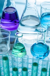 Close-up of laboratory glassware with liquids