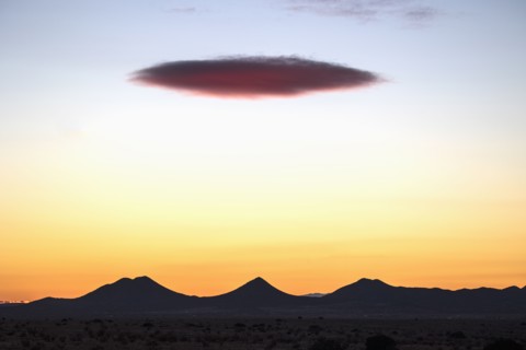 Lenticular cloud over Cerrillos Hills State Park at sunset