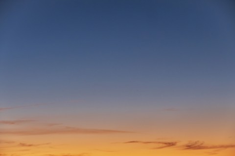 Blue and yellow sunset sky