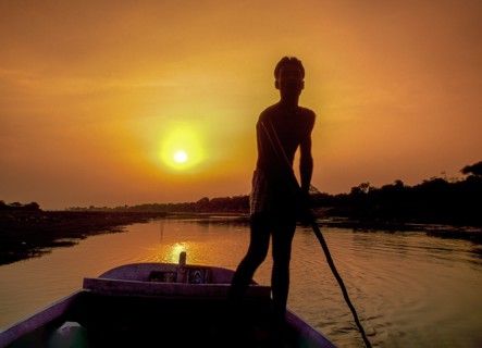 Boatman at sunset