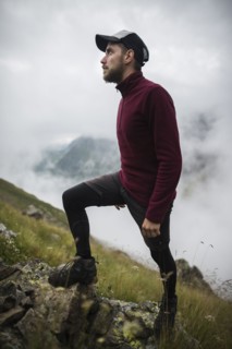Young man hiking in Swiss Alps