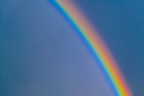Rainbow on blue sky