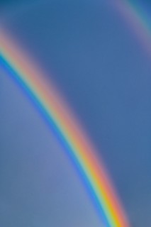 Rainbow on blue sky