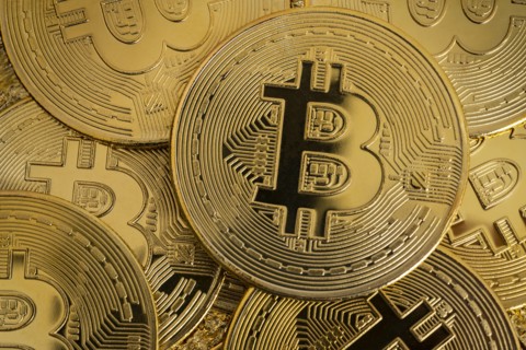 Close-up of golden bitcoins