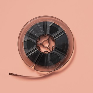 Studio shot of 8 mm film reel