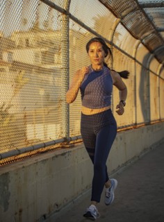 Woman jogging at sunset