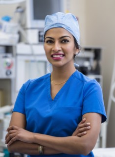 Portrait of female doctor wearing scrubs