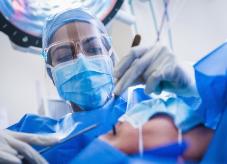 Doctor and patient during surgery