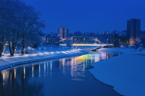 Poland, Subcarpathia, Rzeszow, Illuminated bridge at night in winter