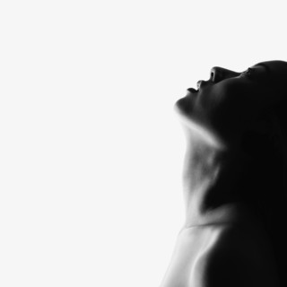 Close-up of profile of woman looking up
