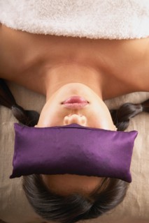 Woman with bag over eyes