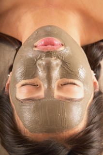 Close-up of woman with facial mask