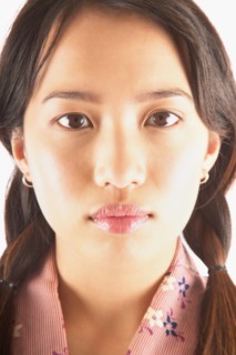 Studio portrait of young woman