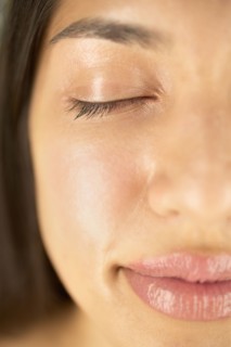 Close-up of woman with eyes closed
