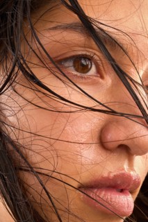 Close-up of woman with wet brown hair