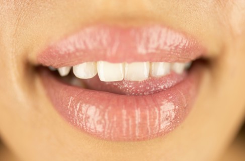 Close-up of smiling woman's lips
