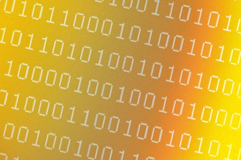 Binary numbers on pixelated yellow computer screen