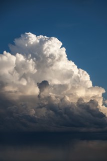 Cumulus storm clouds and rain