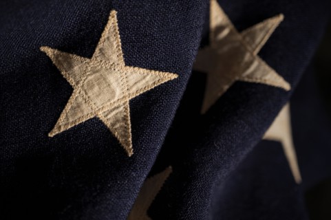 Close-up of stars on retro American flag