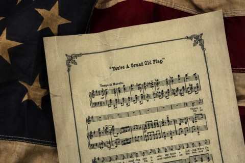 Vintage musical score Youre a Grand Old Flag and American flag