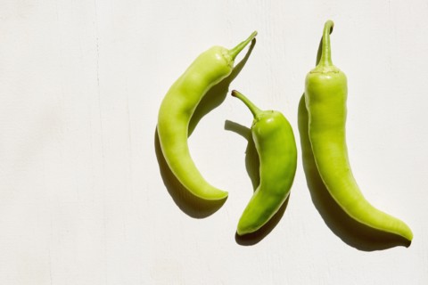 Studio shot of three banana peppers