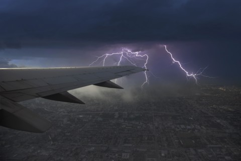 Thunderstorm and lightning seen from airplane