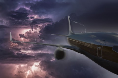 Airplane flying in thunderstorm
