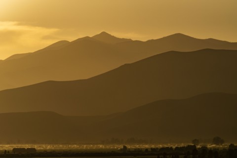 Silhouettes of mountains at sunset