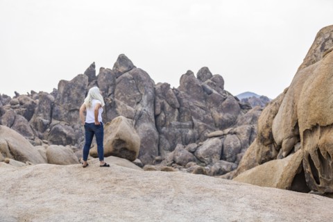 Woman looking at Alabama Hills in Sierra Nevada Mountains