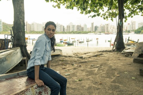 Woman sitting on upside