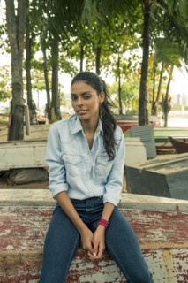 Woman sitting on upside