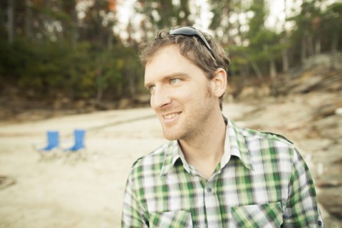 Man standing in clearing
