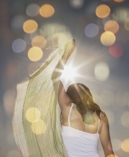 Caucasian woman waving scarf
