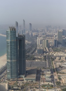 Aerial view of high rise buildings in Abu Dhabi cityscape
