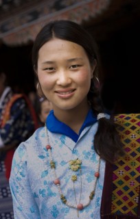 Smiling Asian girl wearing traditional clothing